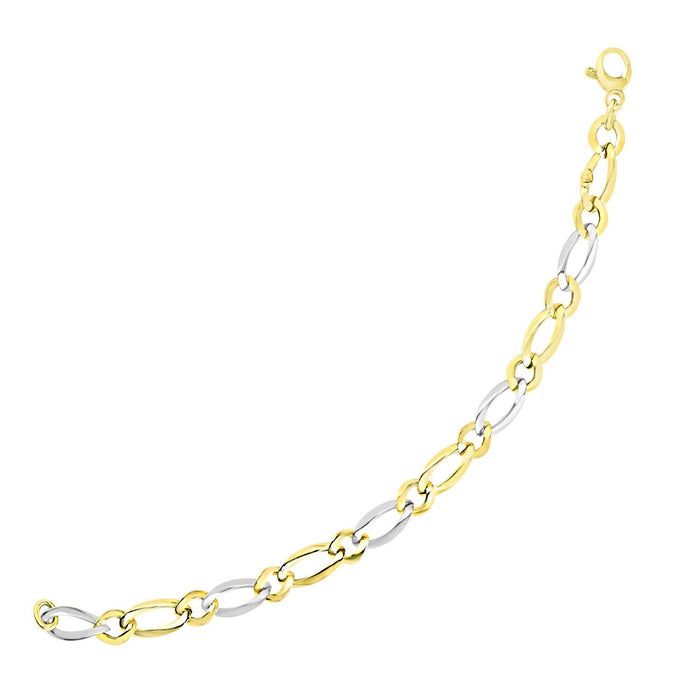 14k Two-Tone Gold Figaro Chain Bracelet with Long and Short Links.